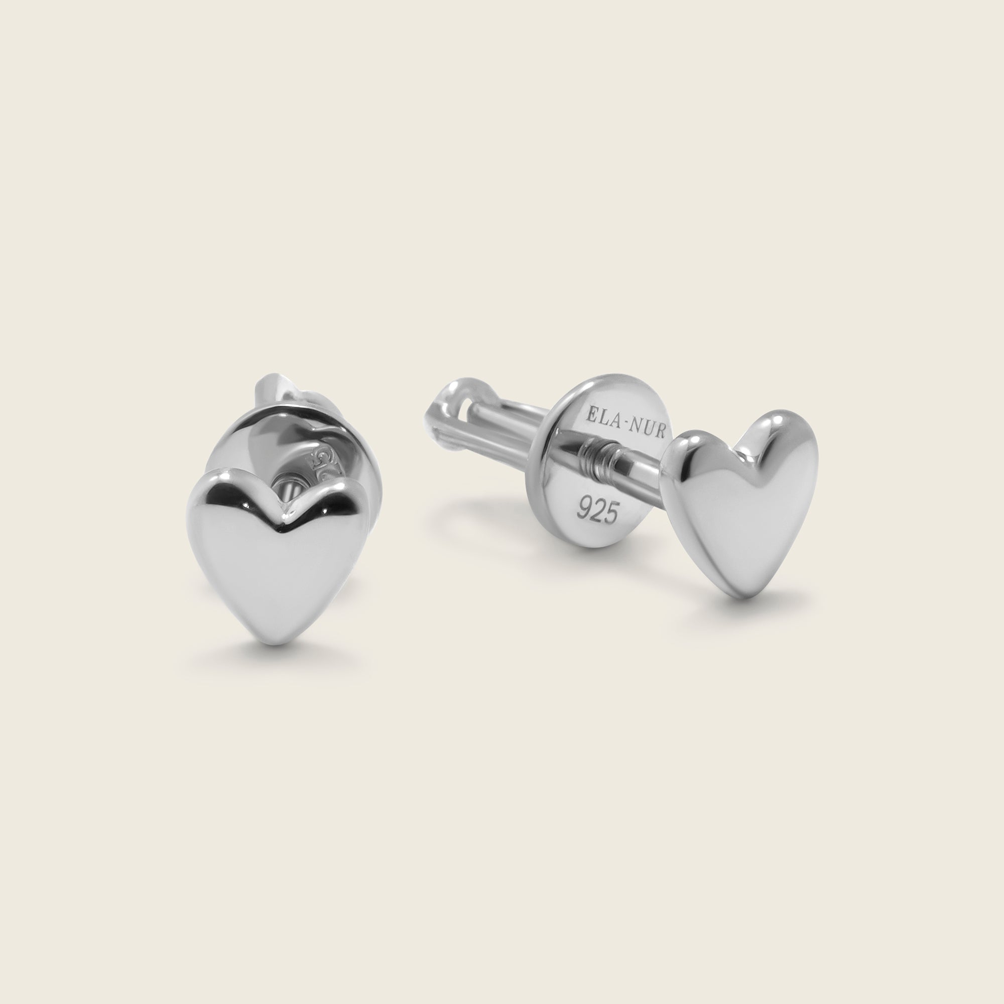 Sterling silver stud earrings in love heart shape with screw backs