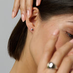 Dainty and sleek silver stud love heart earrings