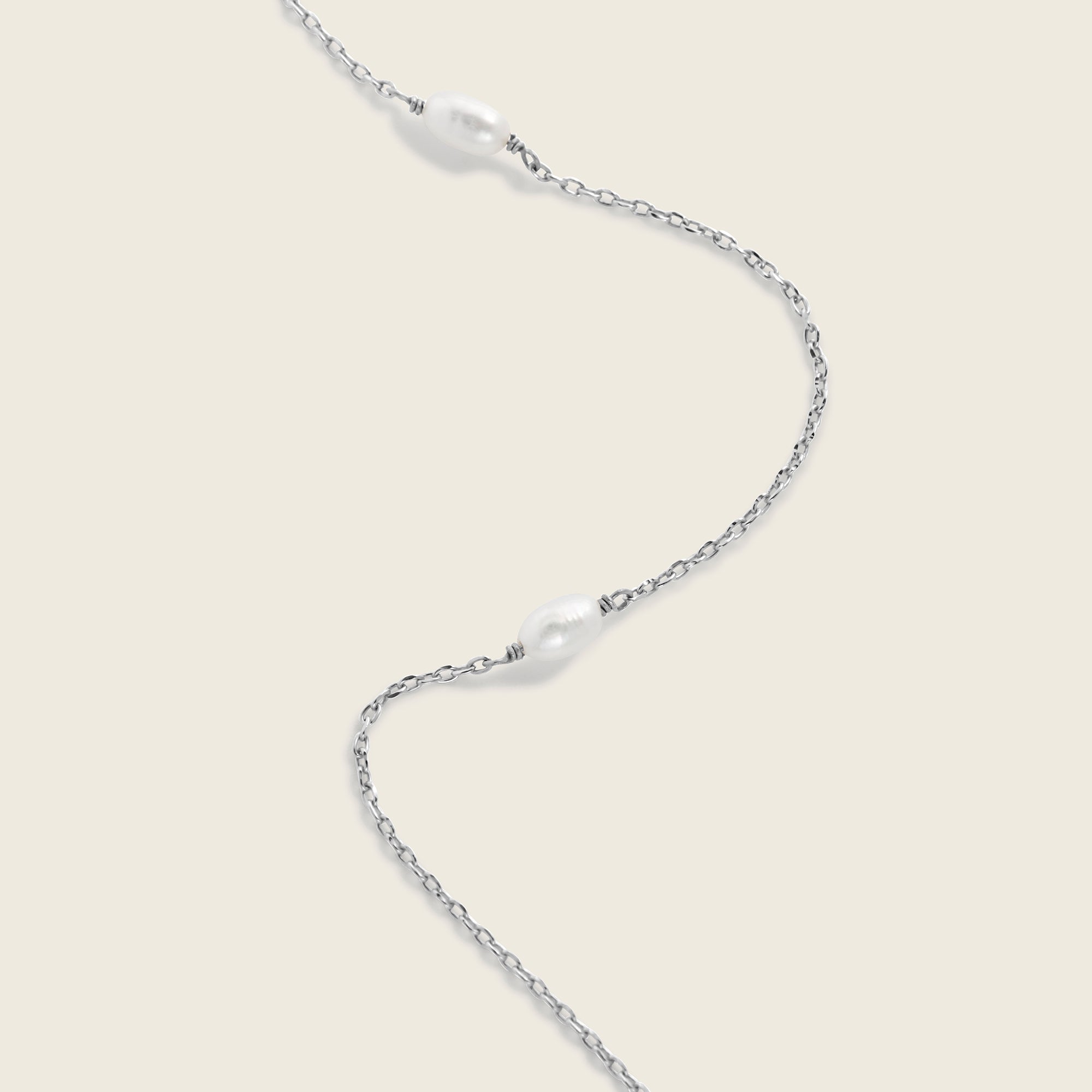 Delicate freshwater pearls hand strung onto a sterling silver chain necklace