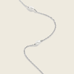 Delicate freshwater pearls hand strung onto a sterling silver chain necklace