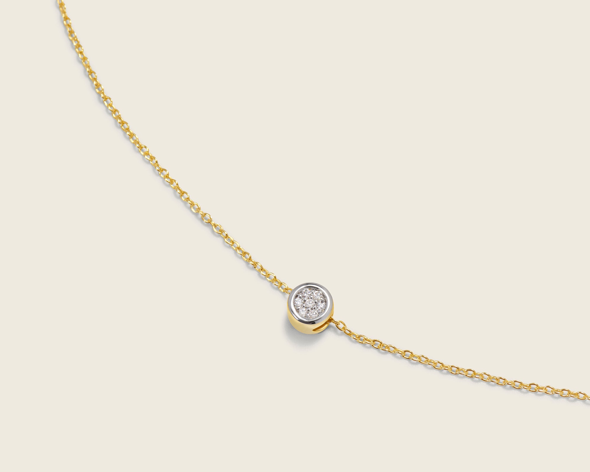 Lab grown diamonds pave set in an 18ct gold vermeil pendent on a delicate gold chain necklace.
