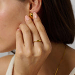 Radiant gold signet ring