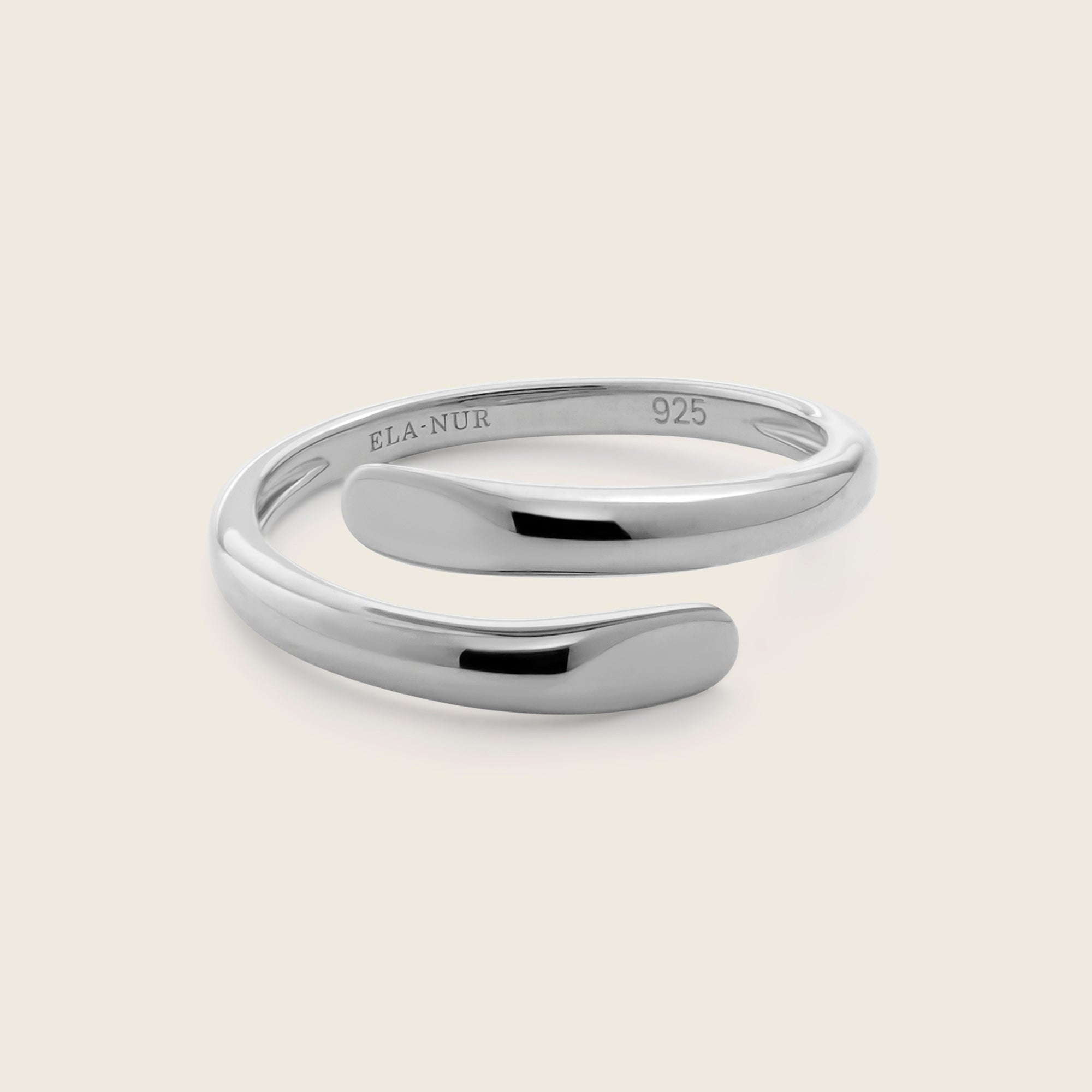 Sleek and shiny Sterling silver open ring with a wrap design